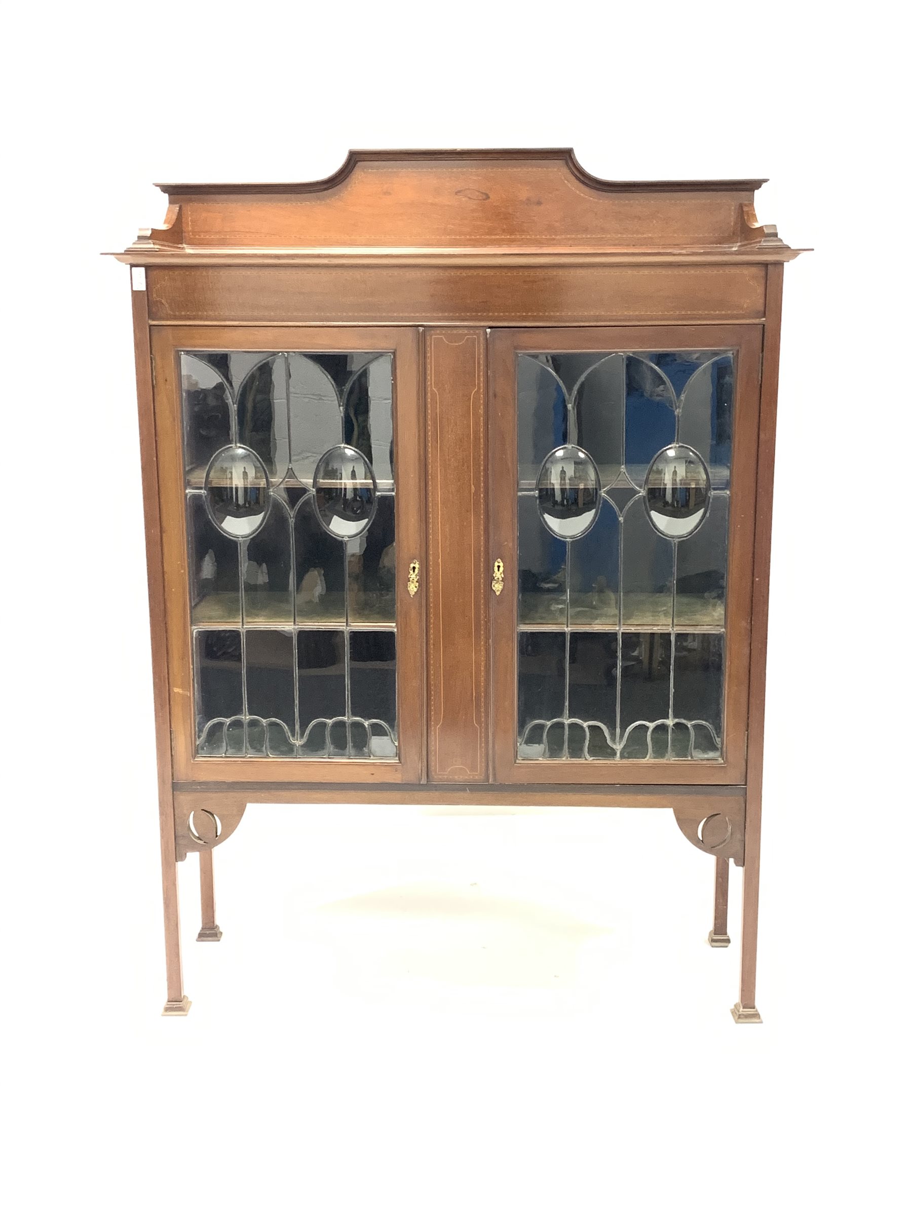 Edwardian Art Nouveau inlaid mahogany display cabinet, with raised back over two glazed doors, raise