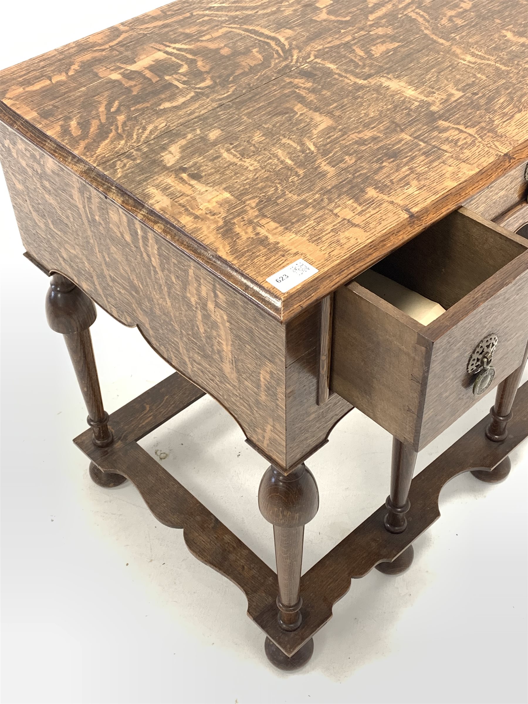 17th century style oak lowboy, fitted with three drawers, raised on turned supports united by shaped - Image 3 of 4