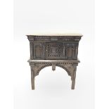 18th century style oak cupboard, with geometric carved door over an architectural arched apron and s