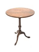19th century mahogany tripod table, the later circular tilt top raised on turned column and three sp