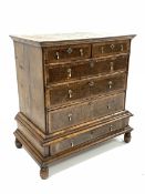 Early 18th century and later Queen Anne burr walnut and oak crossbanded chest on stand, the top sect