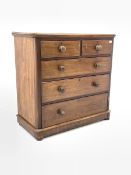 Early Victorian mahogany chest fitted with two short and three long drawers, raised on compressed bu