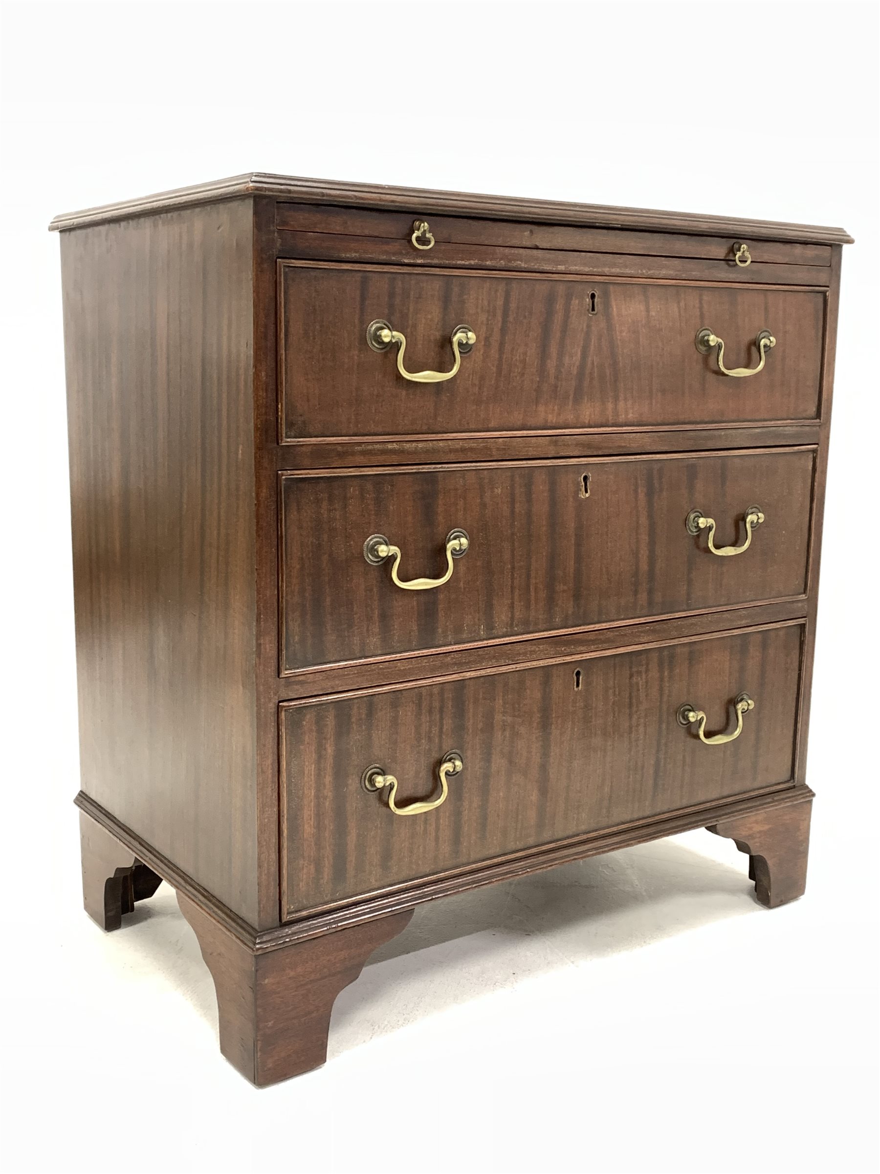 20th century George III style mahogany chest, the top with applied moulding over brushing slide and