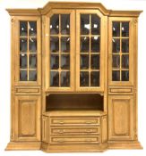 20th century oak breakfront display cabinet, the top section fitted with central glazed cupboard enc