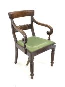 Regency mahogany elbow chair, lobe carved back rail, scrolled and reeded arm supports, drop in uphol