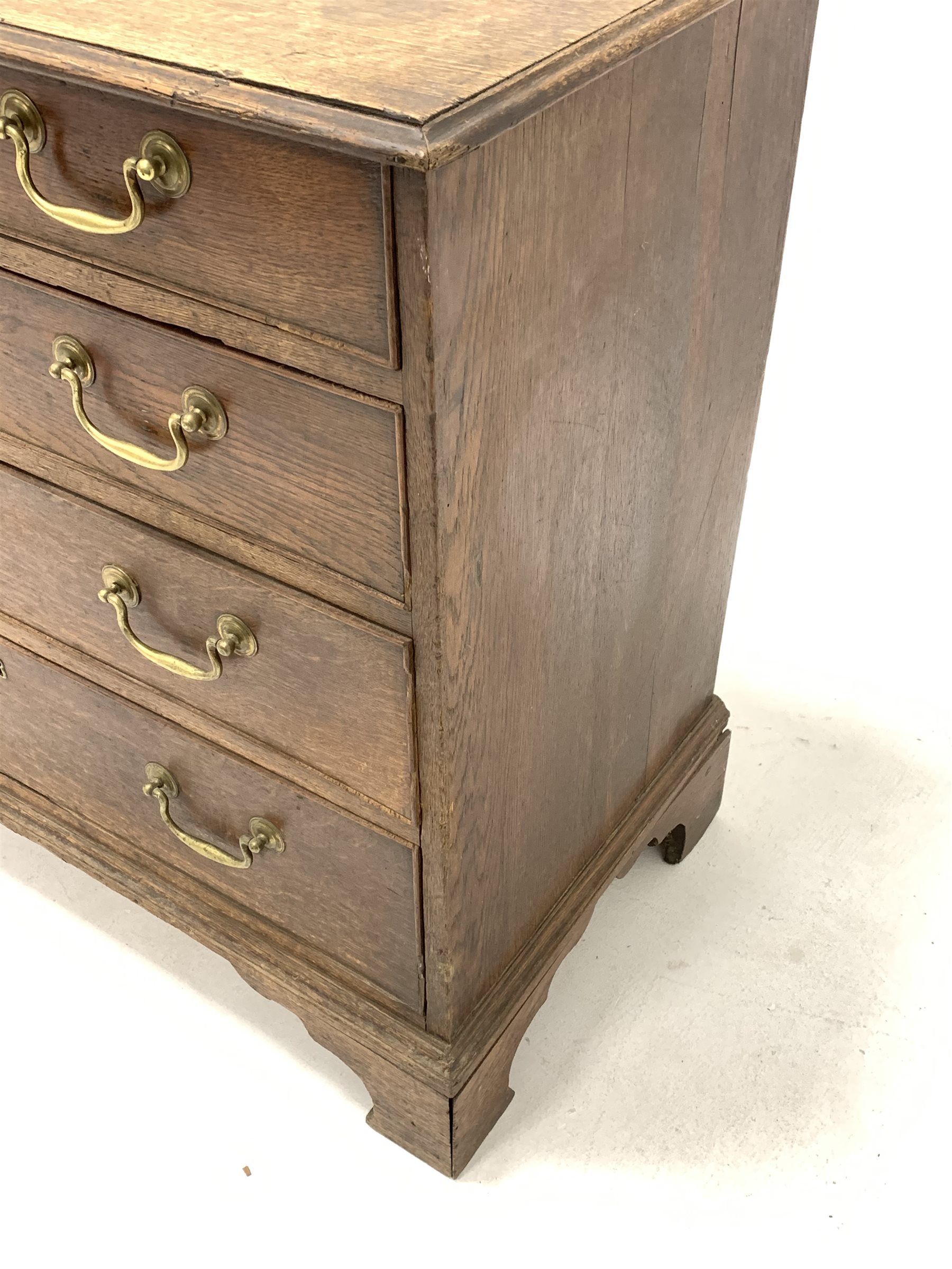 George III oak chest fitted with four long graduated drawers with brass drop handles, raised on brac - Image 3 of 4