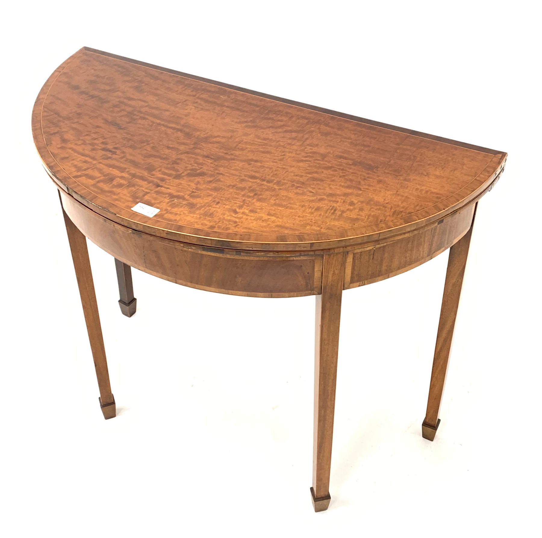 Georgian mahogany demi-lune fold over card table, the crossbanded top lifting to reveal baize lined - Image 2 of 4