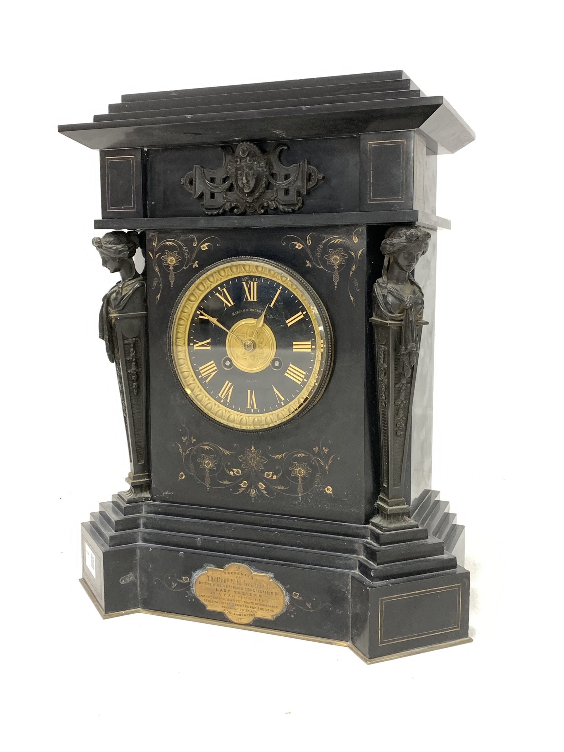 Victorian slate architectural presentation mantel clock, with stepped top over applied bronze mask,