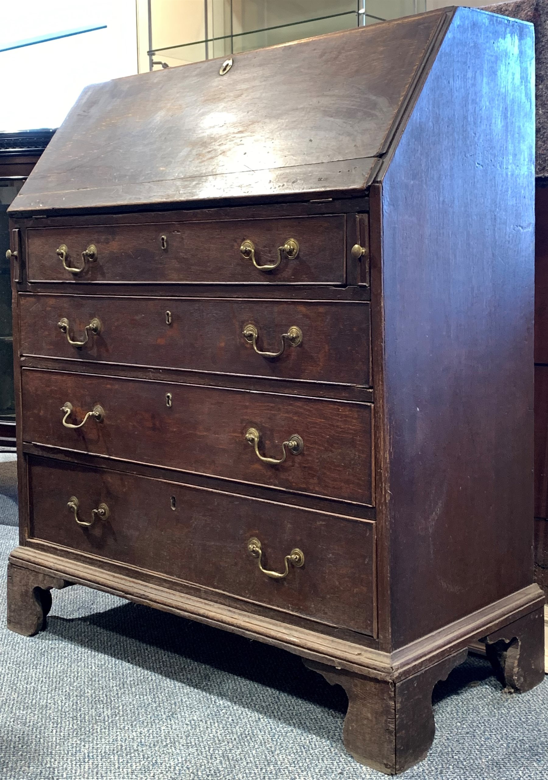 Early 19th century oak bureau, fall front revealing fitted interior over four long graduated drawers - Image 2 of 3