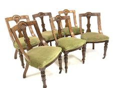 Set six Late Victorian oak dining chairs, lunette carved crest rail over upholstered seats, raised o