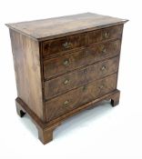 18th century walnut chest, cross banded top over two short and three long graduated drawers with her