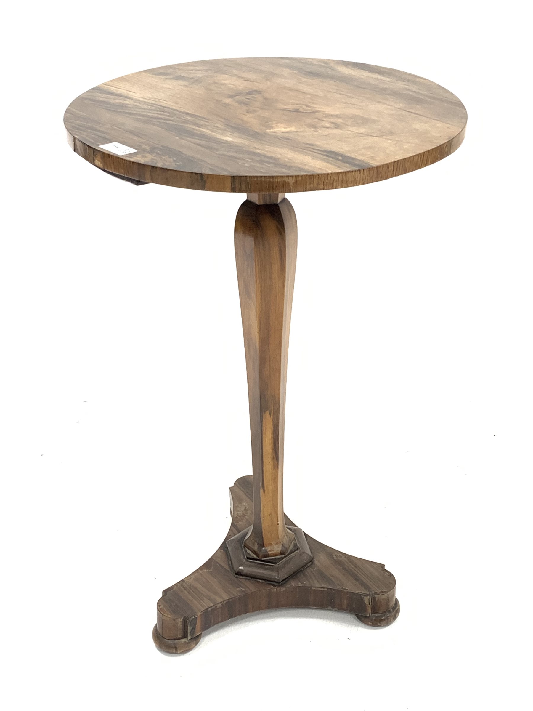 Mid 19th century rosewood lamp table, the circular top raised on a shaped and tapered octagonal colu