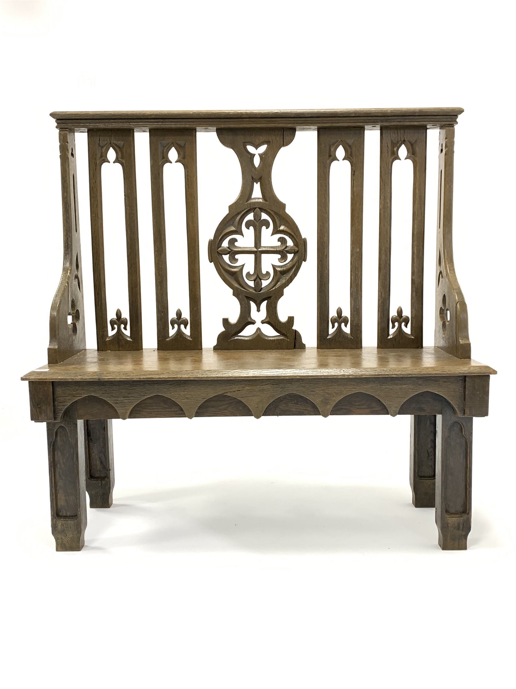 19th century oak hall bench of Gothic design, with arched splats carved with fleur de lis, chamfered - Image 2 of 5