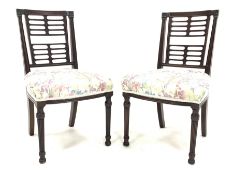 Pair late 19th mahogany side chairs, the fluted and flower head carved cresting rail over a horizont