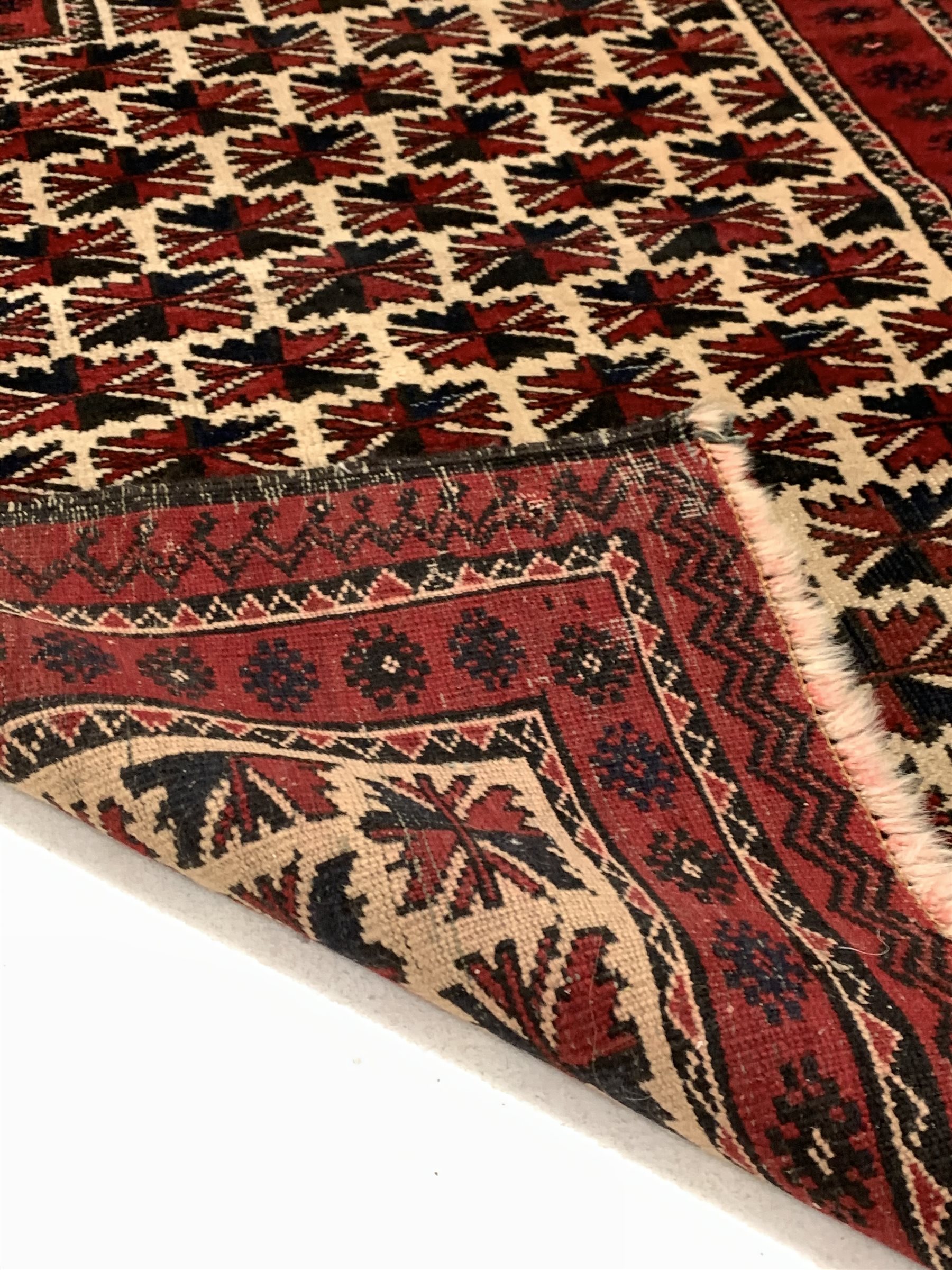 Persian runner rug, with repeating blue design on red field, (250cm x 56cm) together with a Persian - Image 5 of 5