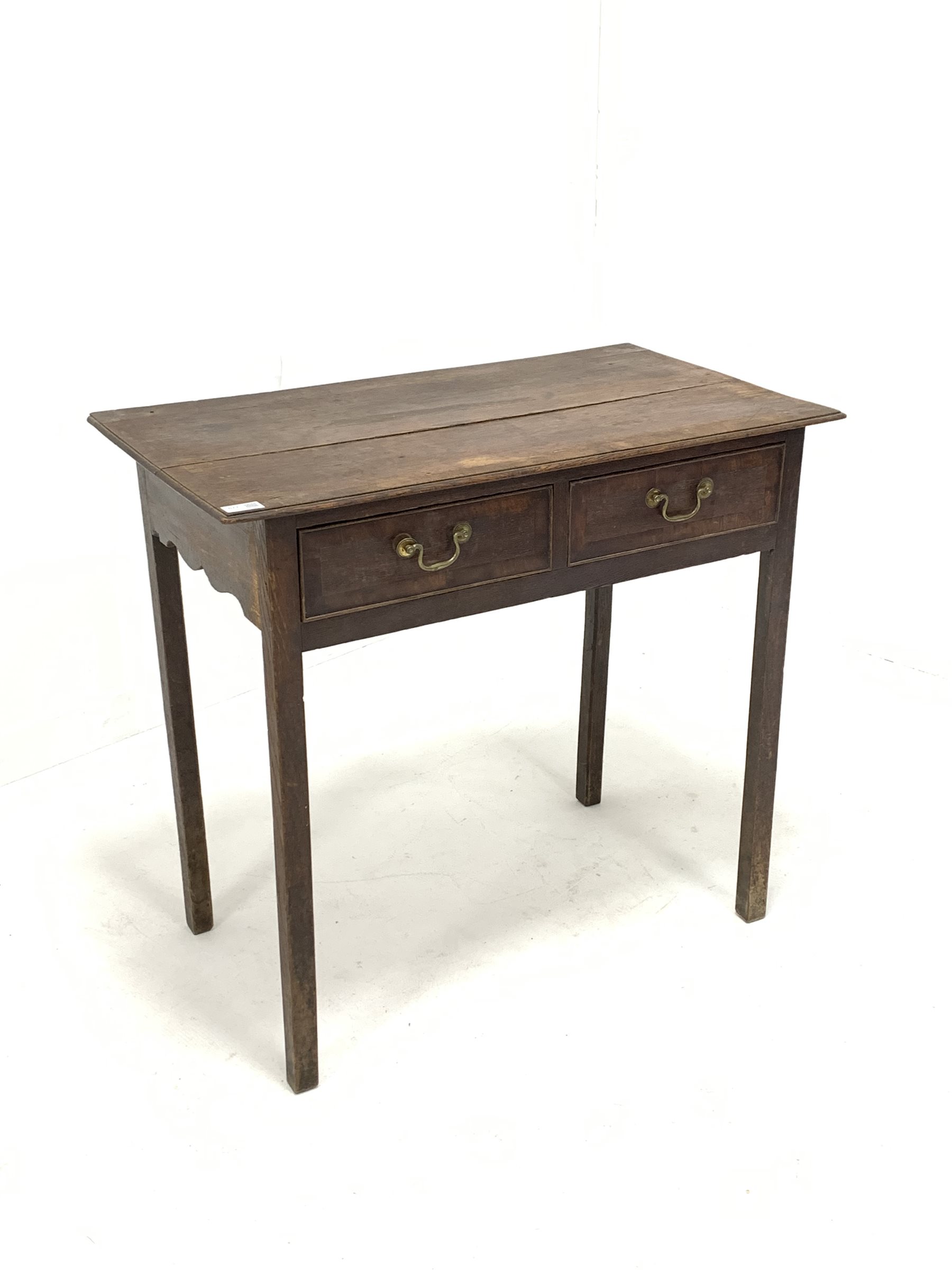 George III oak side table, mahogany crossbanded top and two drawers, raised on square chamfered supp