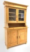 20th century pine country kitchen dresser, projecting cornice over double glazed doors enclosing two