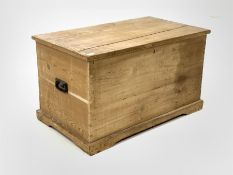 Early 20th Century pine blanket box with hinged lid and carry handle to each end