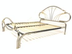 Contemporary chrome and brass double bed, with slatted base