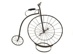 Copy of a Victorian Penny Farthing or high wheeler ordinary bicycle, iron framed, turned fruit wood