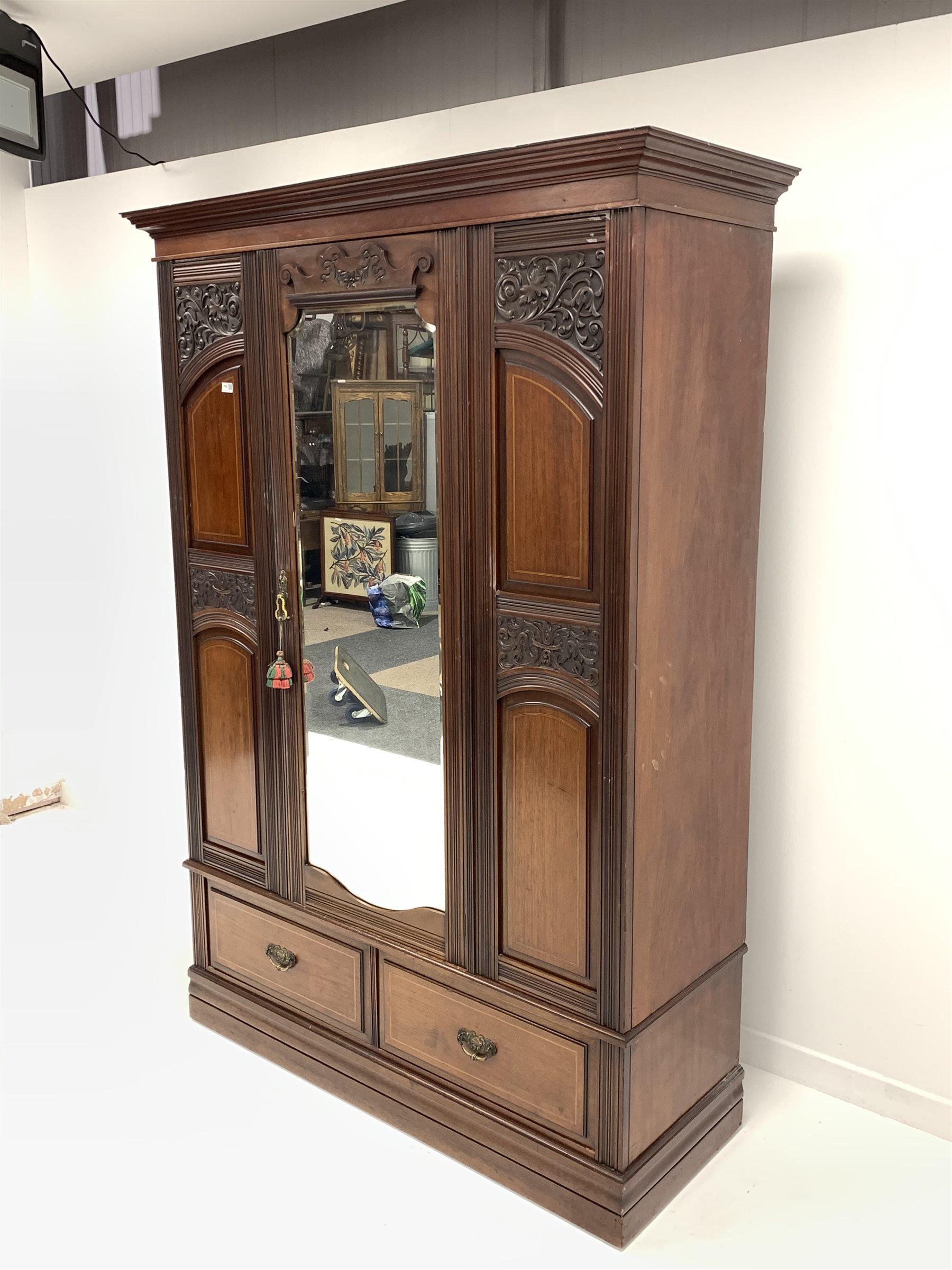 Late Victorian mahogany wardrobe, projecting cornice over panelled and carved front, centre bevelled - Image 3 of 7