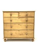 Victorian style pine chest fitted with two short and three long graduated drawers, raised on turned