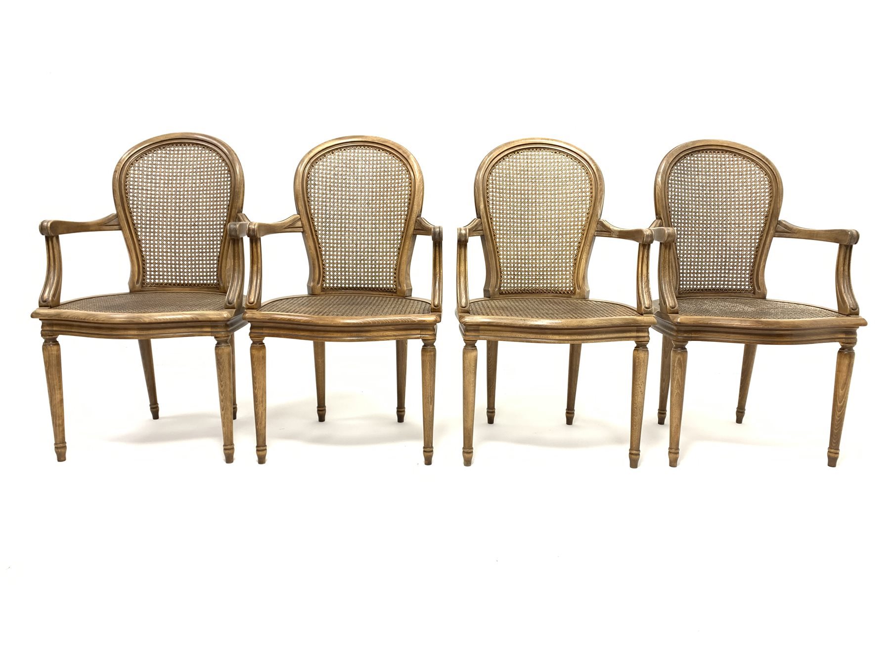 Set four French style berg�re open armchairs, moulded beech frames, curved cane work backs and serpe