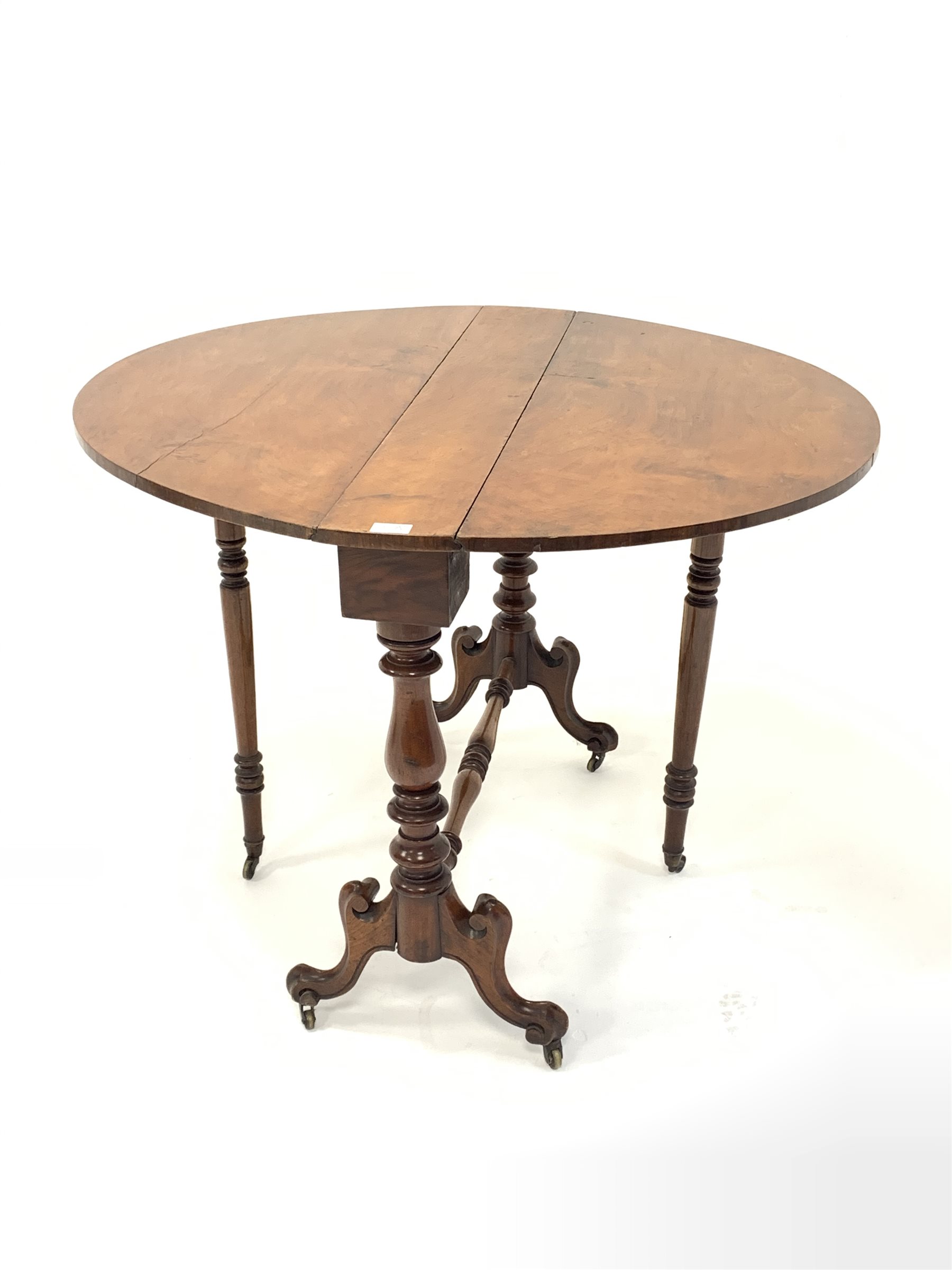 Victorian walnut drop leaf oval table, raised on four scroll carved splayed supports united by turne - Image 2 of 4