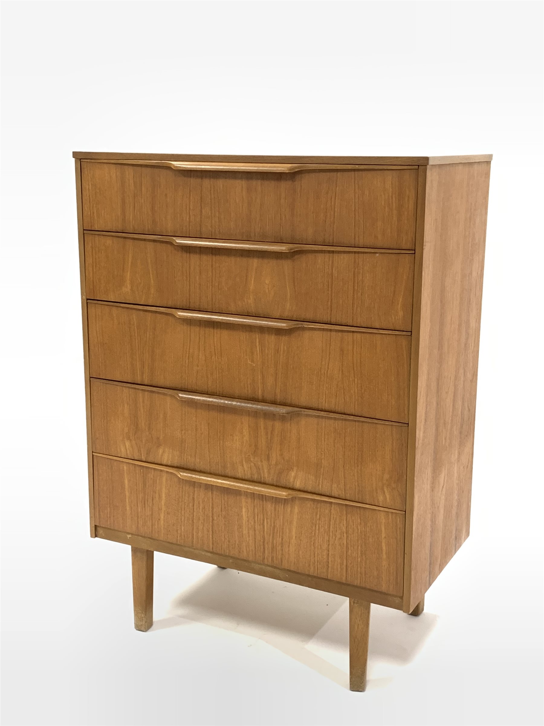 Mid 20th century teak chest fitted with fitted with five graduated drawers, raised on square tapered