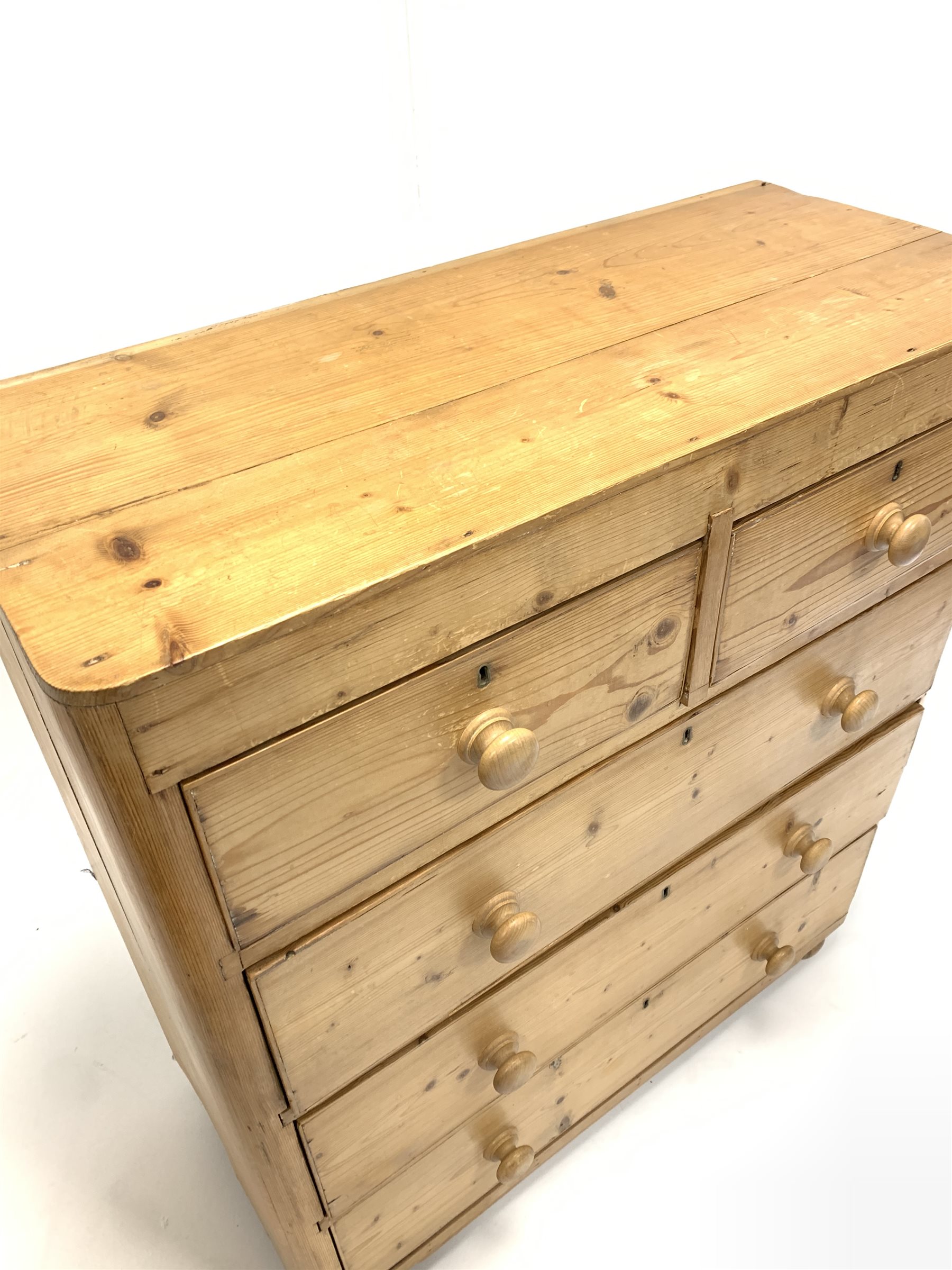 Early 20th century pine chest, fitted with two short and three long drawers, raised on bun supports - Image 2 of 3