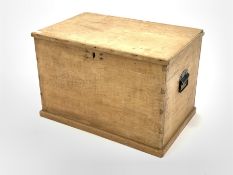 Early 20th century pine blanket box, with candle tray to the interior and carry handle to each end