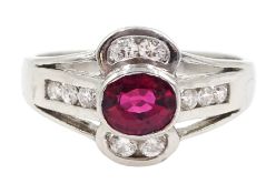 18ct white gold oval ruby and diamond ring, hallmarked