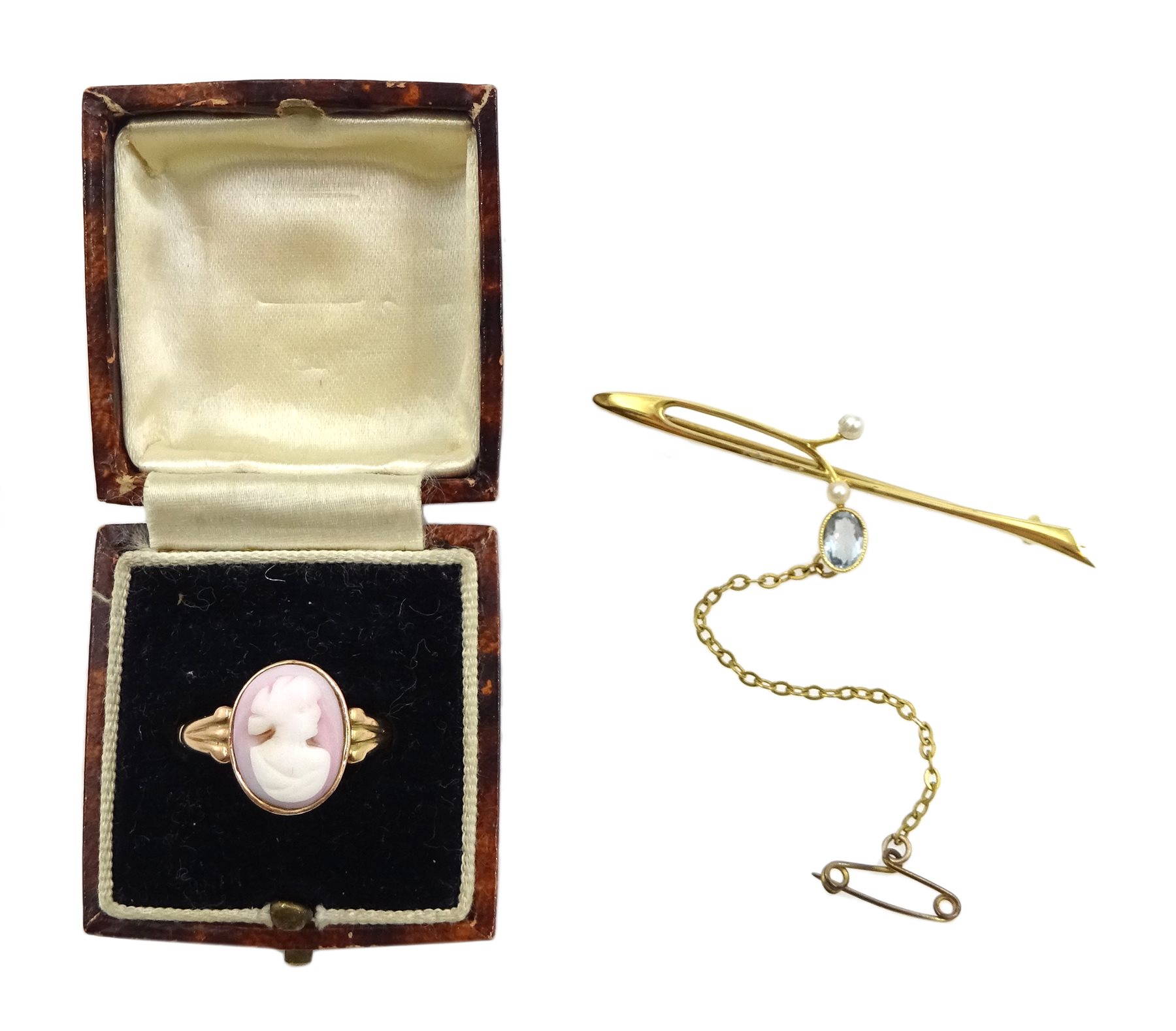 Early 20th century 9ct rose gold cameo ring, Birmingham 1919 and a gold blue topaz and pearl bar bro