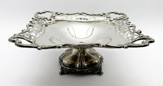 Square silver fruit dish with a pierced floral and scroll border on a pedestal foot 20cm square Shef