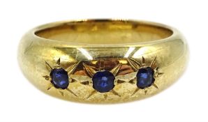 9ct gold sapphire three stone gypsy set ring, hallmarked