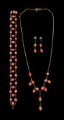 Gold coral pendant necklace and bracelet, both 14ct, stamped 585 and pair of similar 9ct gold stud e