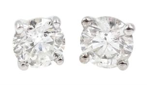 Pair of 18ct white gold round brilliant cut diamond stud earrings, stamped 750, total diamond weight