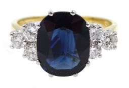 18ct gold oval sapphire ring, each side set with three diamonds, hallmarked, sapphire approx 3.10 ca