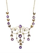 Edwardian Art Nouveau 9ct gold amethyst and split seed pearl necklace, of open work scroll and folia