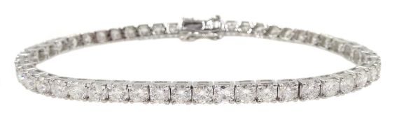 White gold round brilliant cut diamond line bracelet, stamped 18K, total diamond weight 7.20 carat