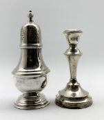 Silver vase shape sugar caster H18cm London 1961 6.3oz and a silver candlestick H14cm