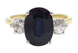 18ct gold three stone oval sapphire and diamond ring, hallmarked, sapphire approx 2.60 carat, total