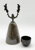 Silver wager cup of typical form with a female figure with arms aloft H23cm