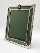 Silver upright table photograph frame, the top rail with a figure of St Andrew, in an easel frame 28