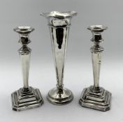 Pair silver table candlesticks with panel sided tapering stems and stepped square bases H21cm Sheffi