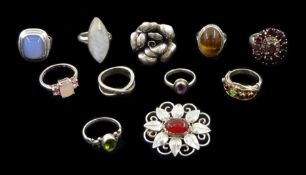 Ten silver and stone set silver rings including diamond, amethyst, agate, garnet, moonstone and peri