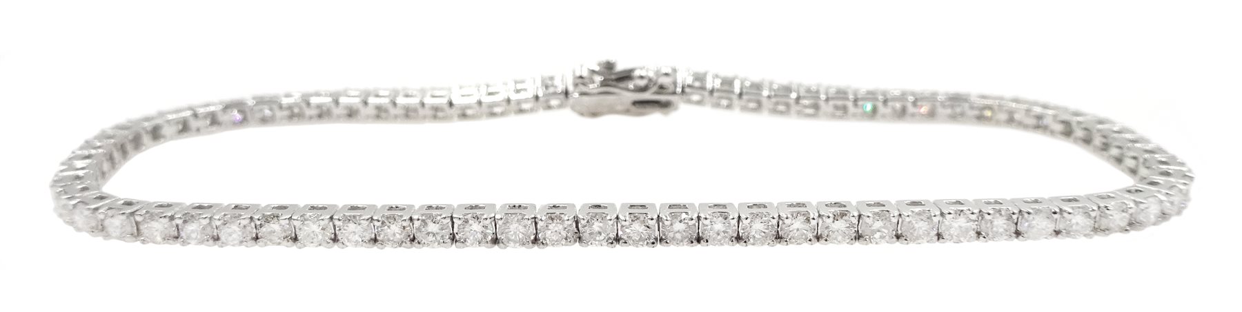 White gold round brilliant cut diamond line bracelet, stamped 18K, total diamond weight approx 2.65