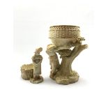 Royal Worcester blush ivory jardini�re, the basket on figural support depicting young girl beside a
