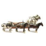 Pair of Beswick grey harnessed shire horses No.818 pulling a single furrow plough and on a wooden ba