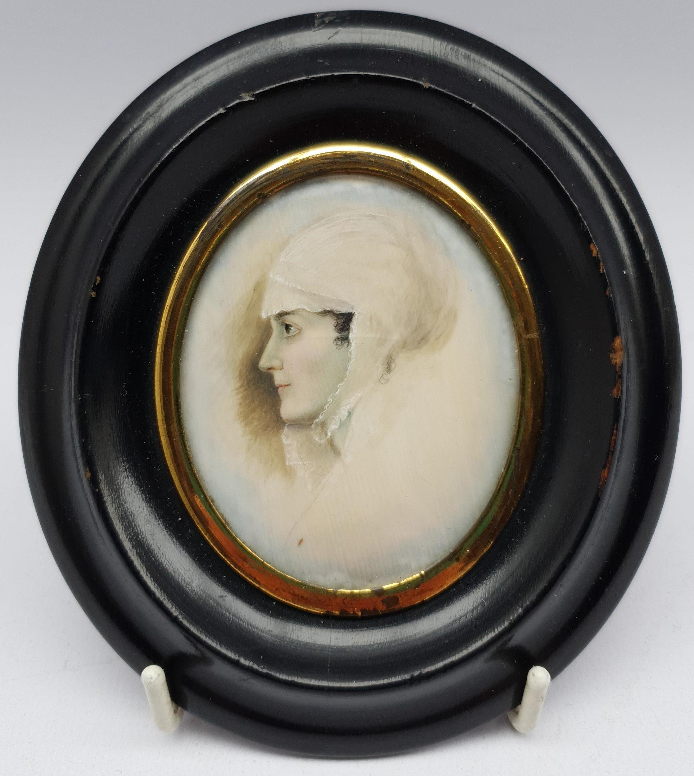 English School (19th century): Portrait of a Lady with a Bonnet, oval miniature on ivory unsigned 7c